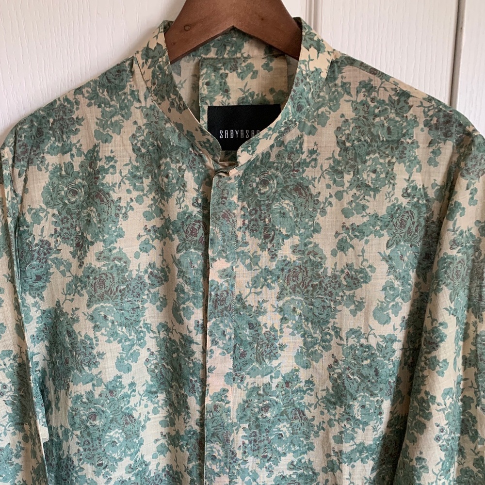 Men’s Sabyasachi Kurta set with embroidered vest in floral print.